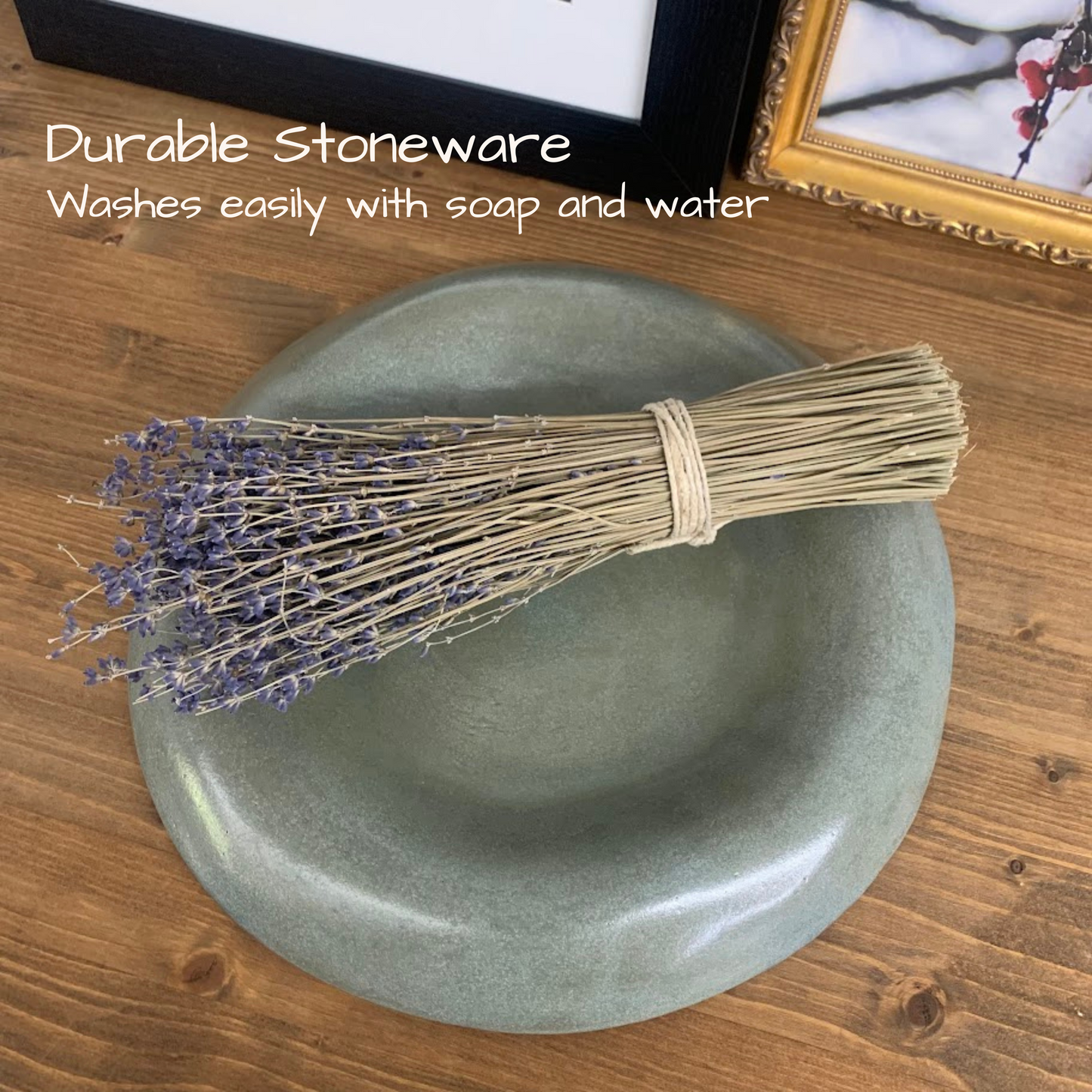 Neutral green stoneware plate with a bunch of dried lavender on a wooden surface, with text about durable stoneware and easy washing.