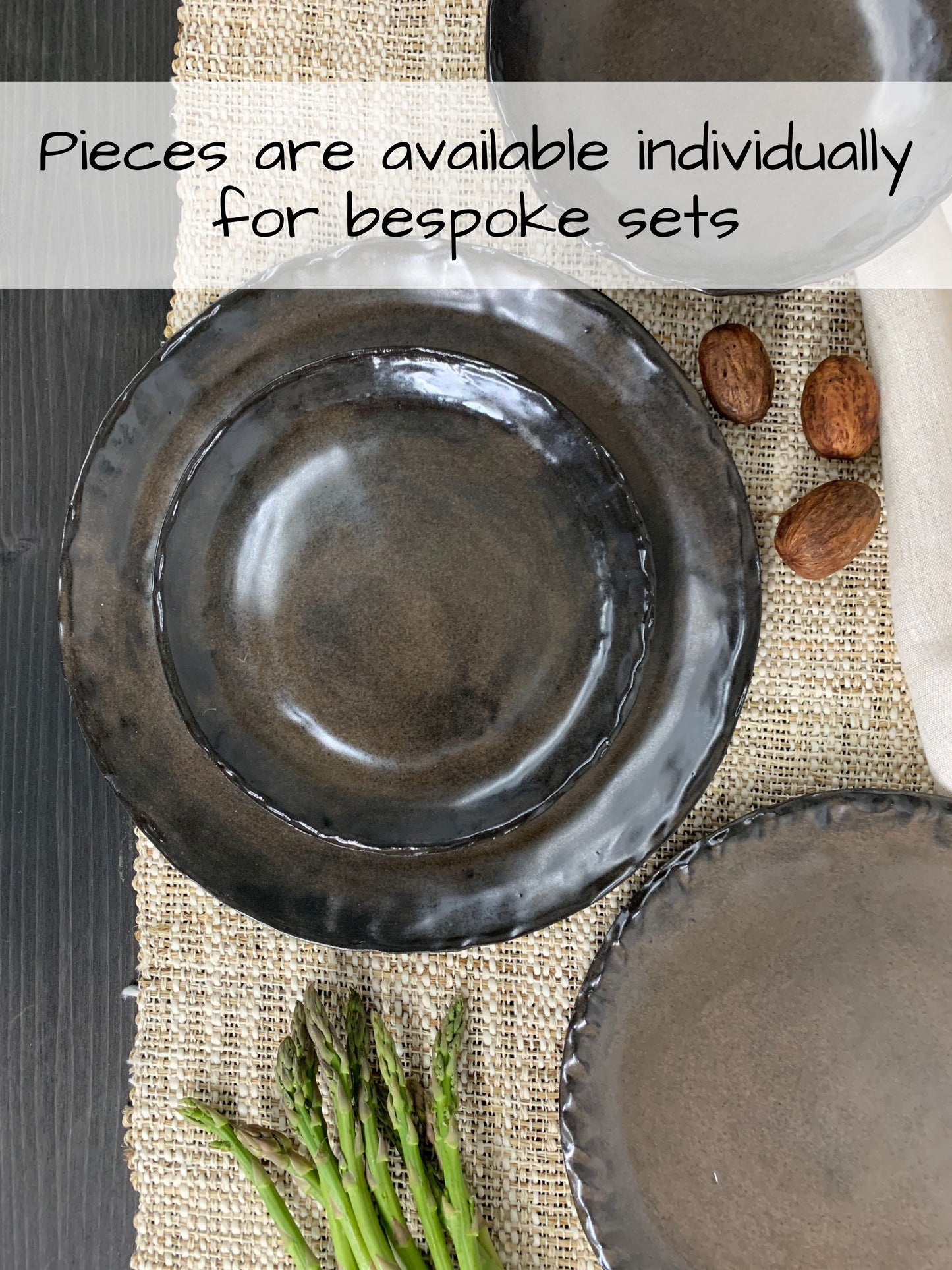 Handcrafted ceramic plates on a textured surface with text overlay