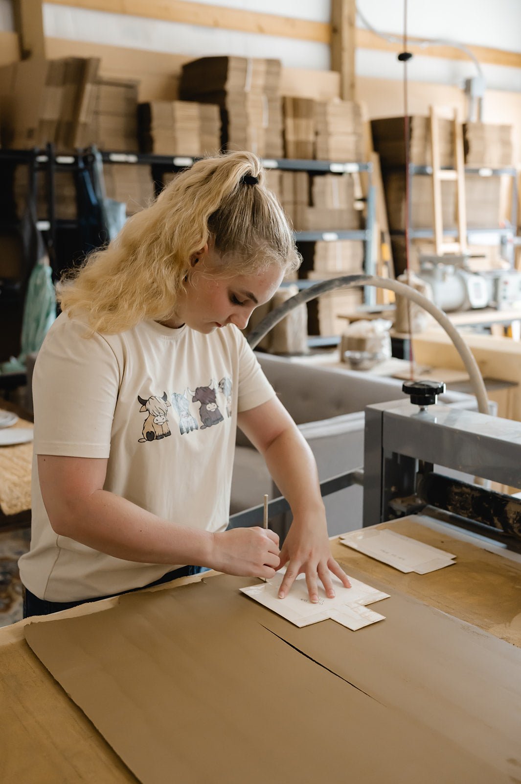 Person working with clay in an art workshop setting