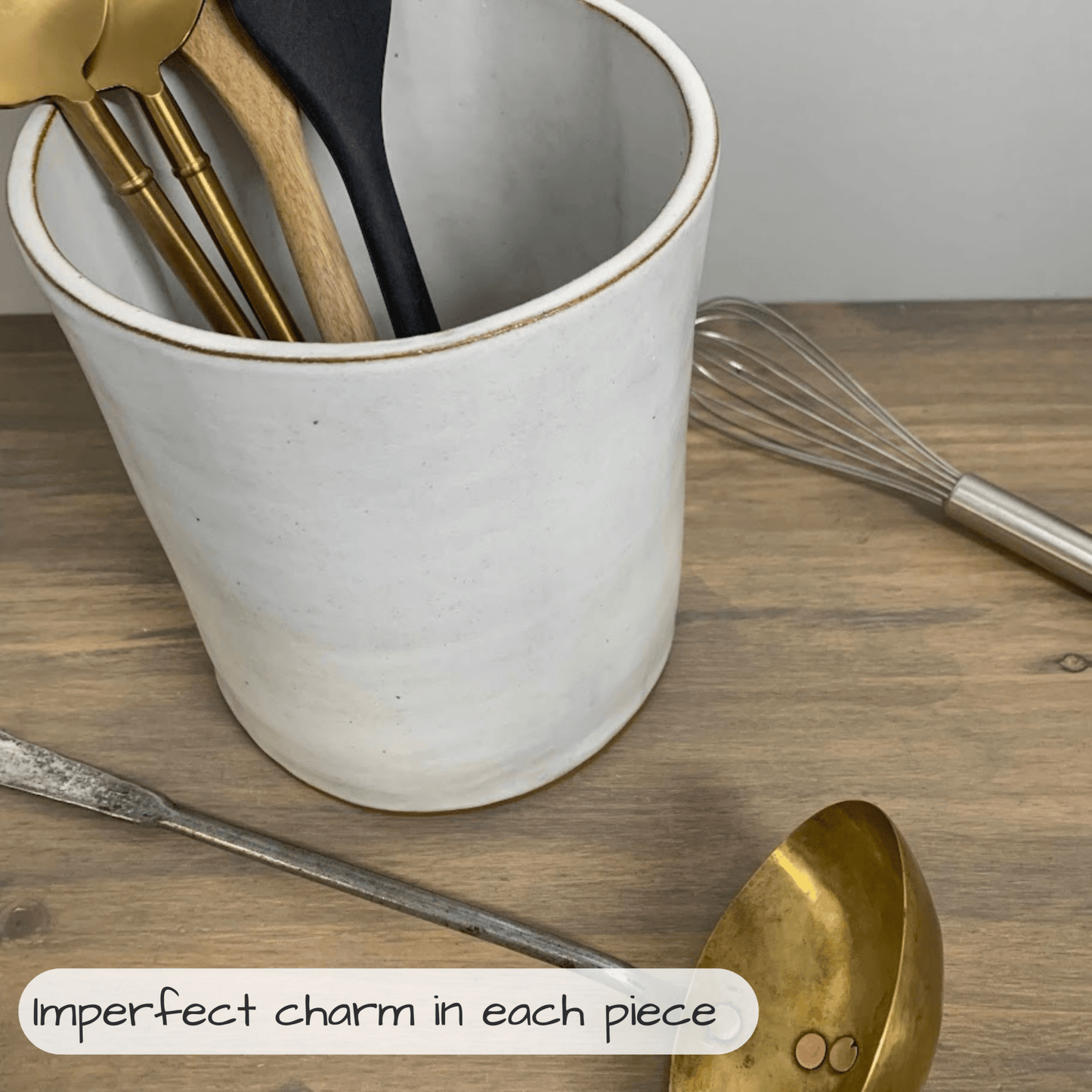 White ceramic container with kitchen utensils on a wooden surface, featuring a text overlay.