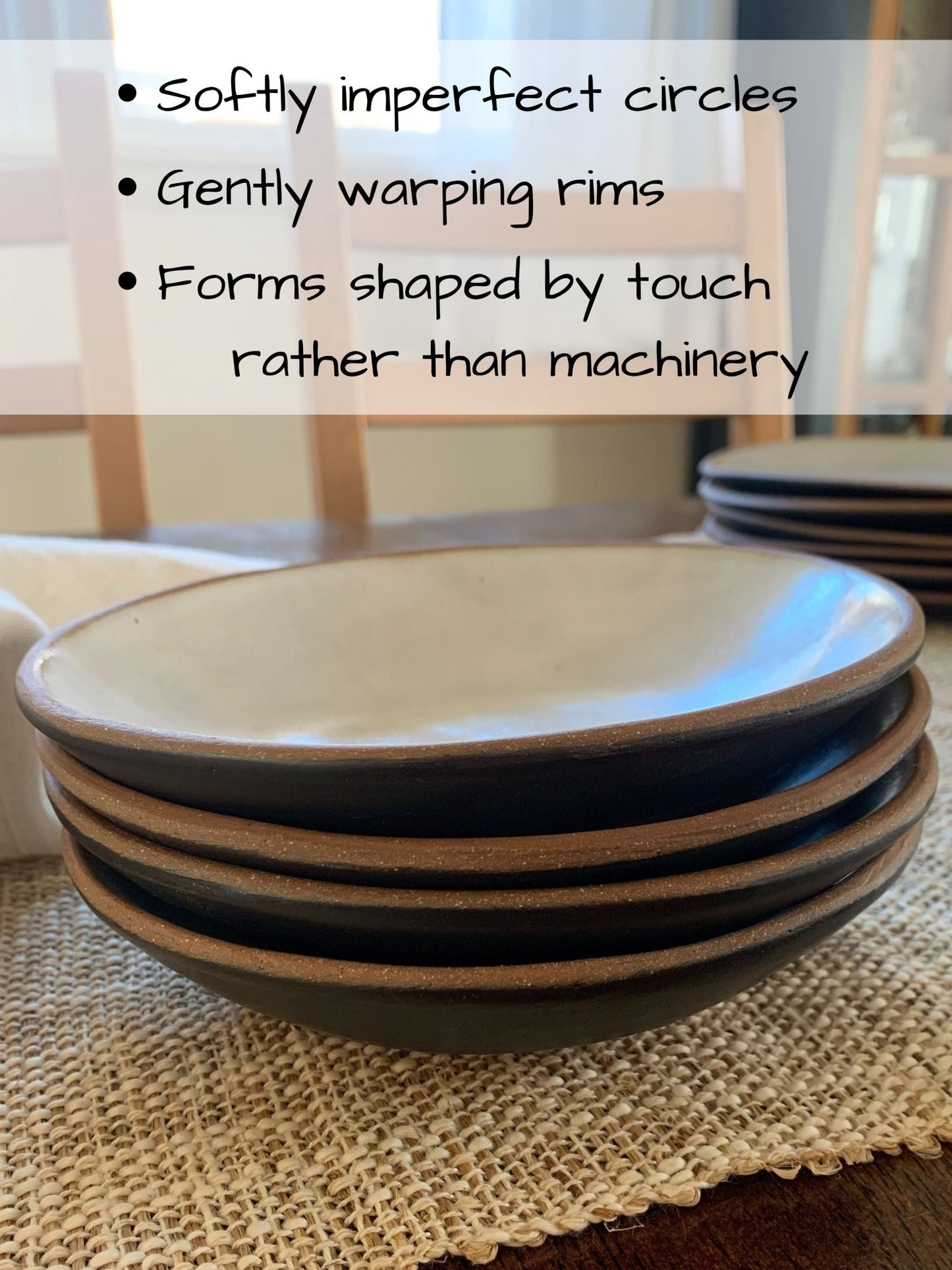 Stack of ceramic bowls on a textured surface with text describing their handcrafted qualities