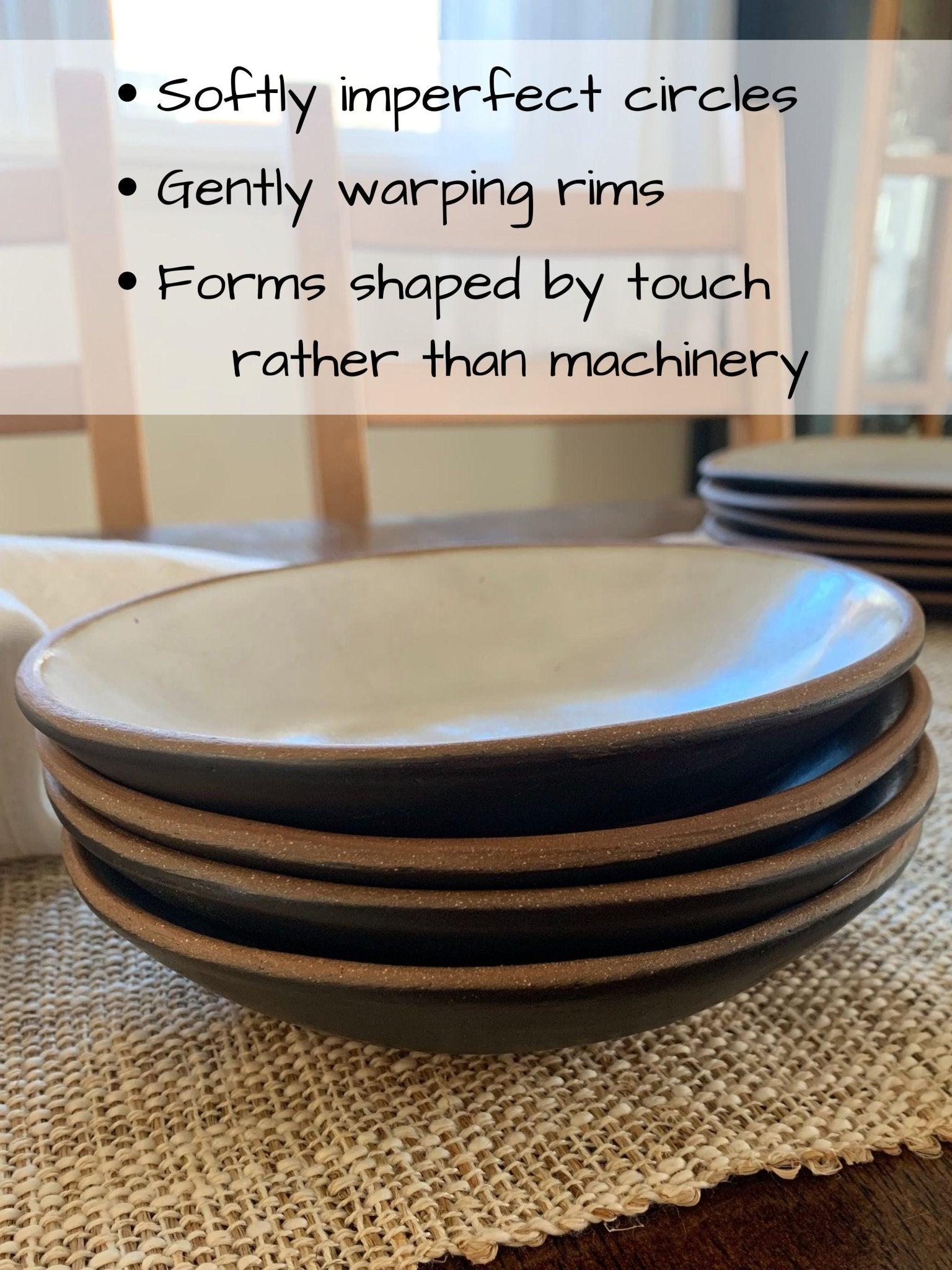 Stack of ceramic bowls on a textured surface with text describing their handcrafted qualities