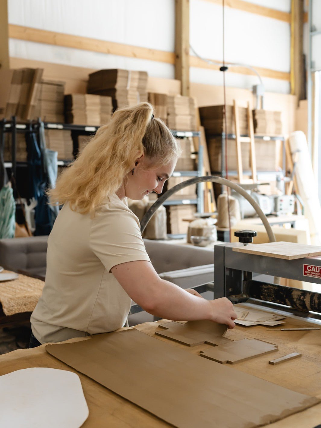 Person working with clay in a ceramic art studio