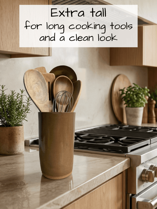 Kitchen counter with a brown handcrafted ceramic utensil holder containing wooden utensils, text overlay about height and appearance.