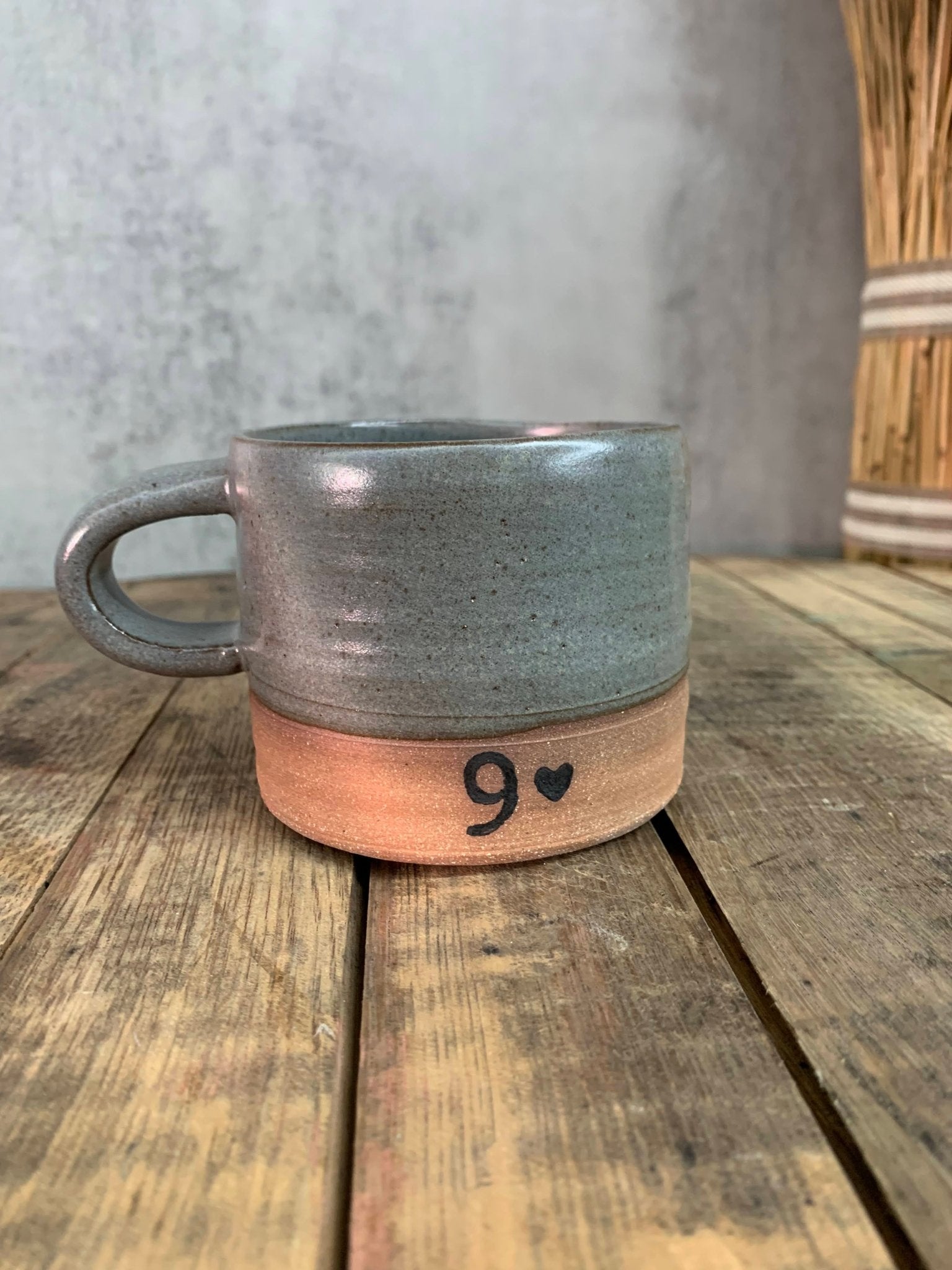Ceramic mug on a wooden surface